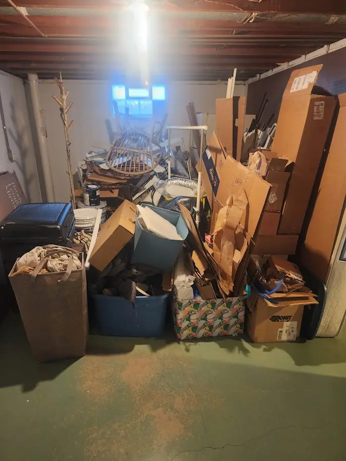 Roll-off dumpster container at job site for 4 Yard Dumpster Rental in Carney